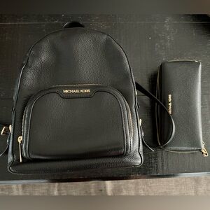 Michael Kor’s Black Backpack with matching wallet